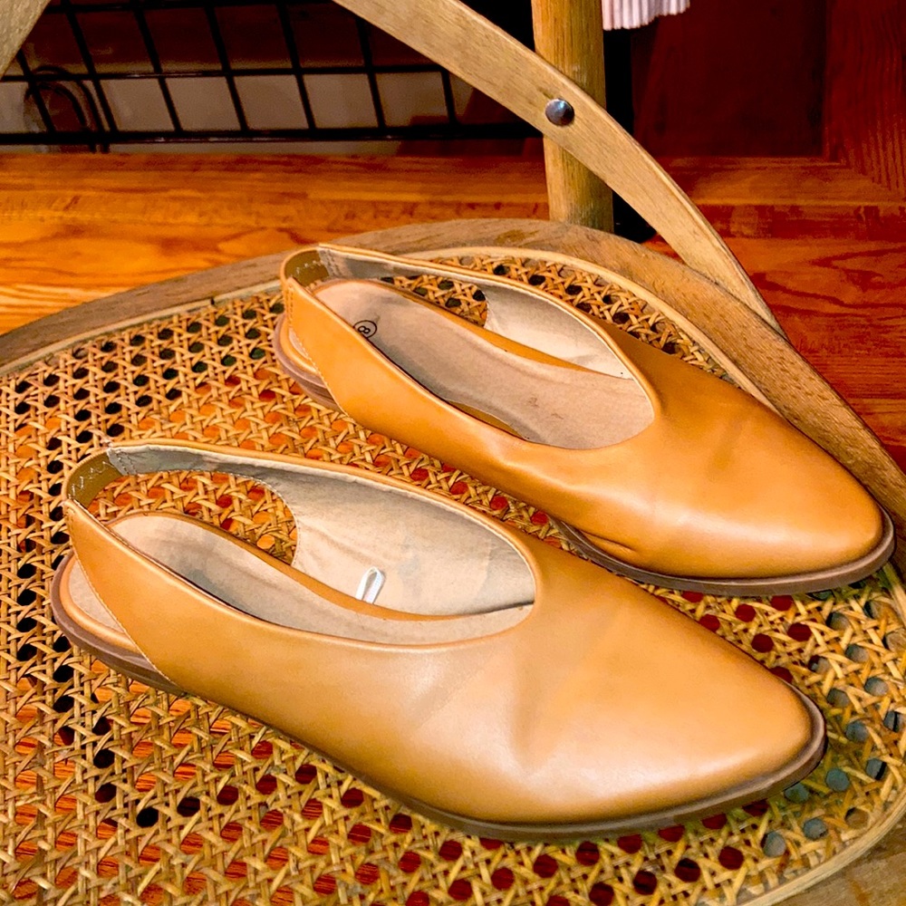 Tan flat sandals. Faux leather